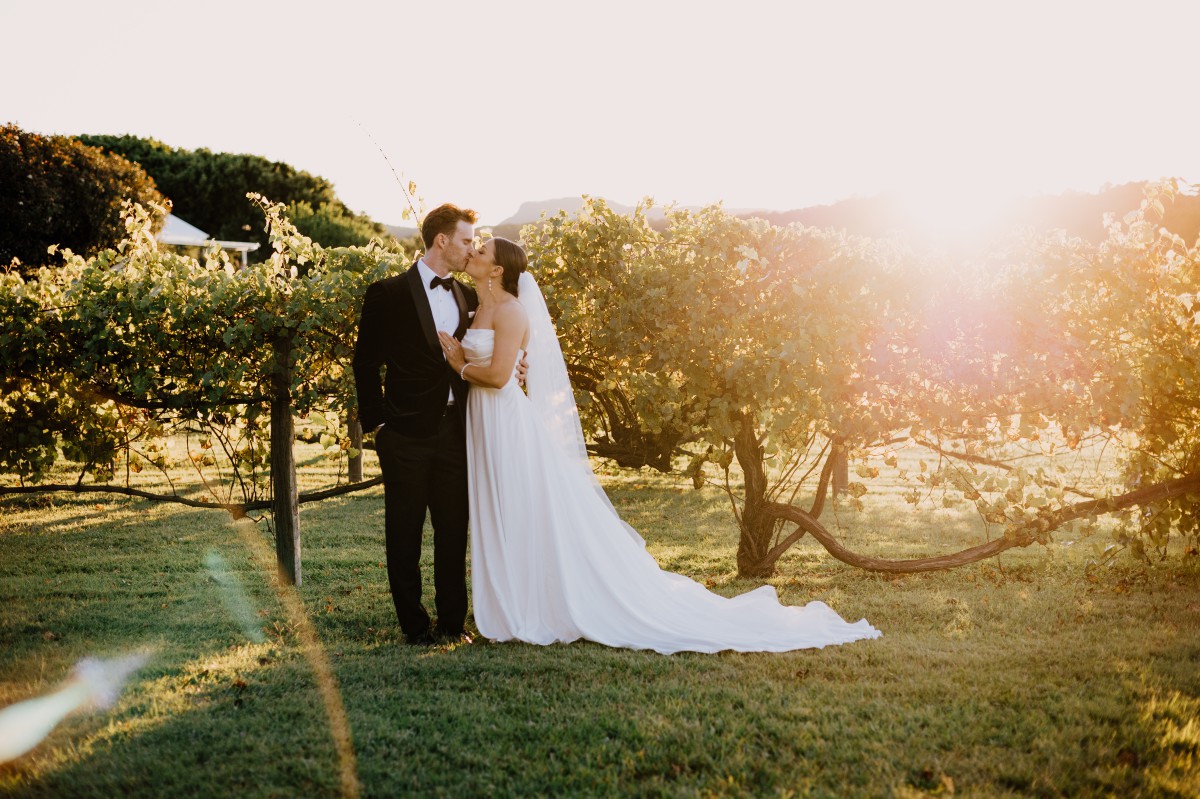 Bride and groom in the vineyards, Brisbane wedding photographer Kirk Willcox Photography