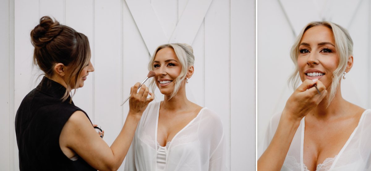 Bride getting makeup on her wedding day