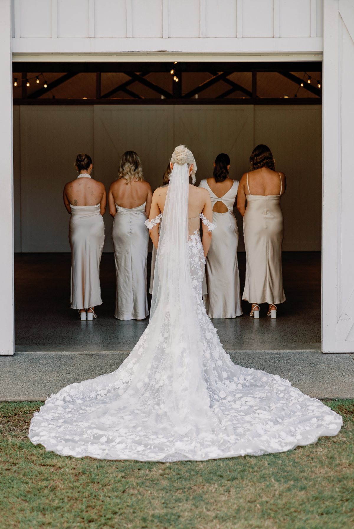Bride reveals her wedding dress to bridesmaids for the first time