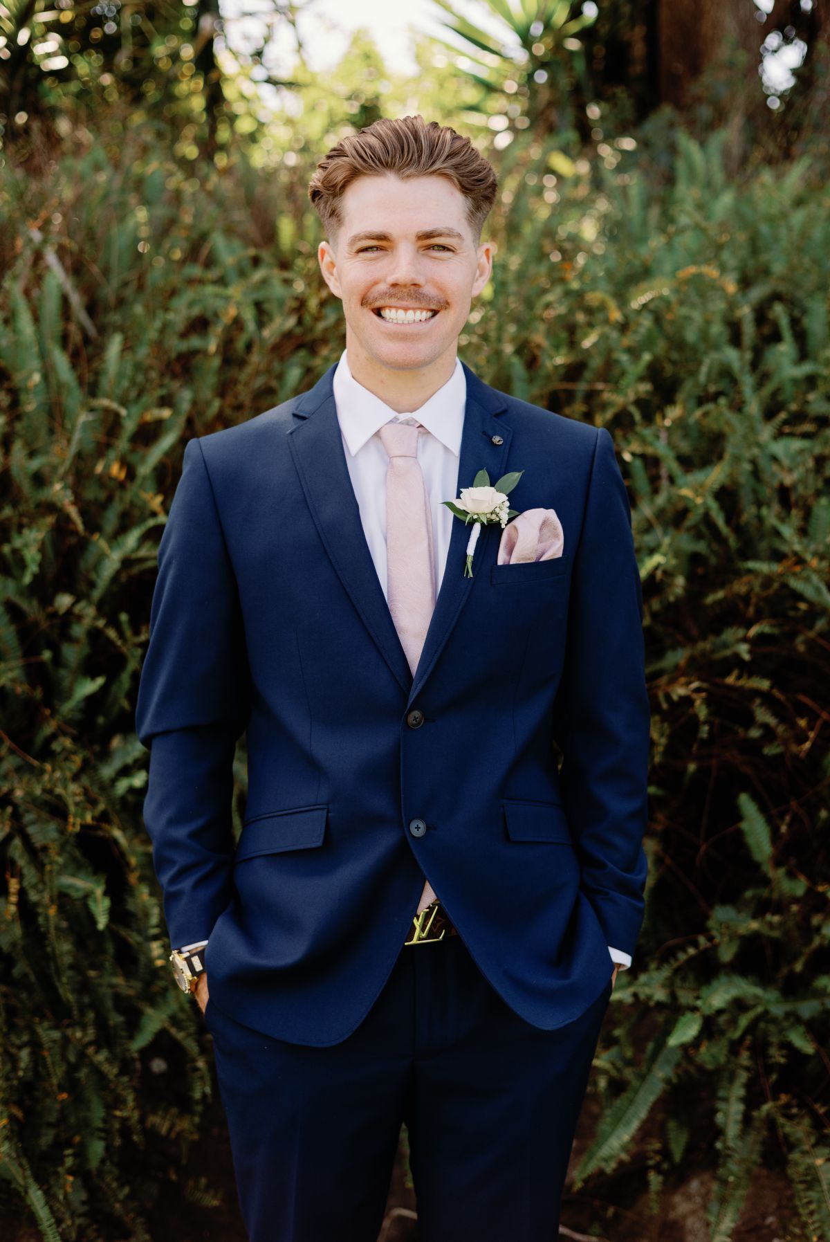 editorial portrait of groom on wedding day